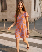 Vestido Caprari estampado floral naranja y lila - detalle.