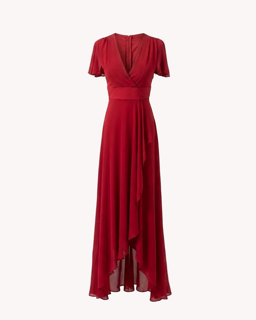 Vestido largo rojo teja con volantes, mostrando diseño elegante y detalles en la parte superior.